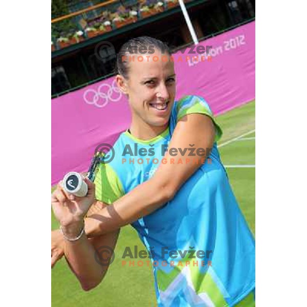 Andreja Klepac of Slovenia in action during practice session at All England Lawn Tennis and Croquet Club in Wimbledon, London 2012 Summer Olympic games, Great Britain on July 25, 2012 