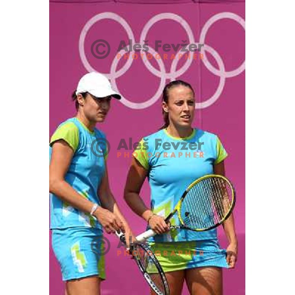 Katarina Srebotnik and Andreja Klepac of Slovenia in action during practice session at All England Lawn Tennis and Croquet Club in Wimbledon, London 2012 Summer Olympic games, Great Britain on July 25, 2012 