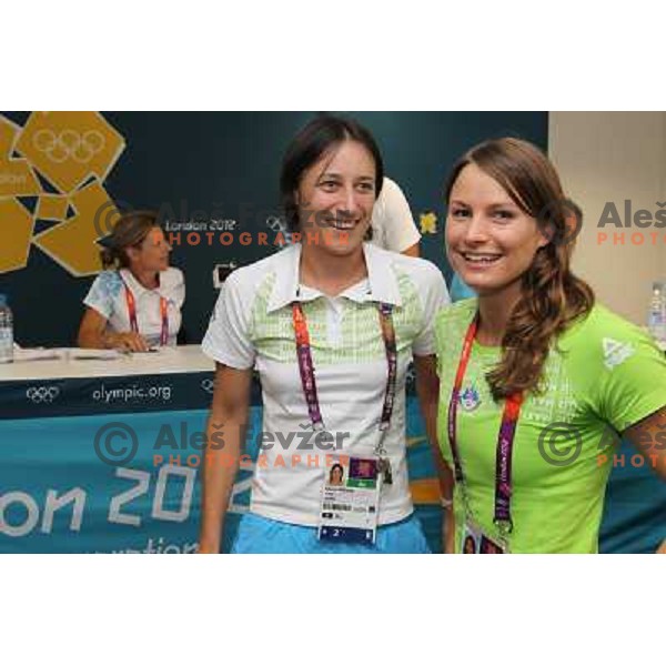 Katarina Srebotnik, Sara Isakovic of Slovenia at press conference of Slovenia Olympic team in Olympic Village during London 2012 Summer Olympic games, Great Britain on July 26, 2012 