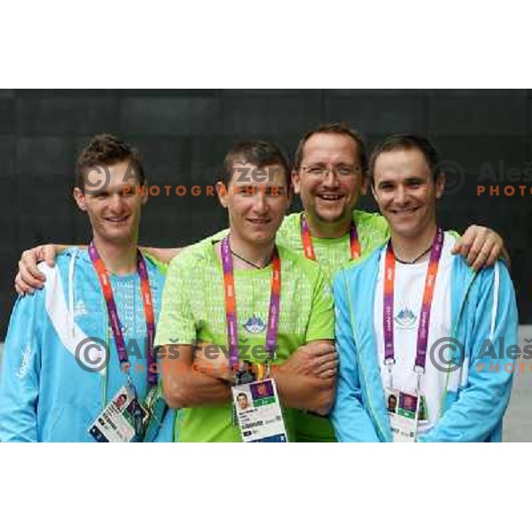 Gregor Bole, Jani Brajkovic, team manager Martin Hvastja, Borut Bozic of Slovenia cycling team during London 2012 Summer Olympic Games, Great Britain on July 27, 2012 