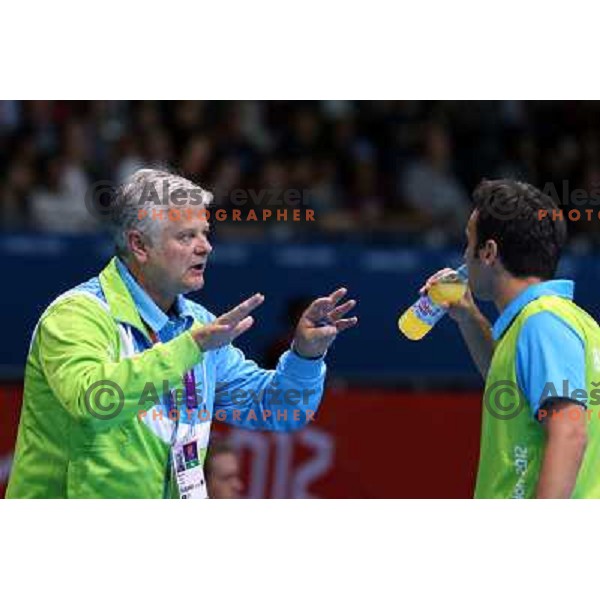 Coach Bojan Rak and Bojan Tokic of Slovenia in action in second round of table tennis tournament in Excel at London 2012 Summer Olympic games on July 29, 2012 