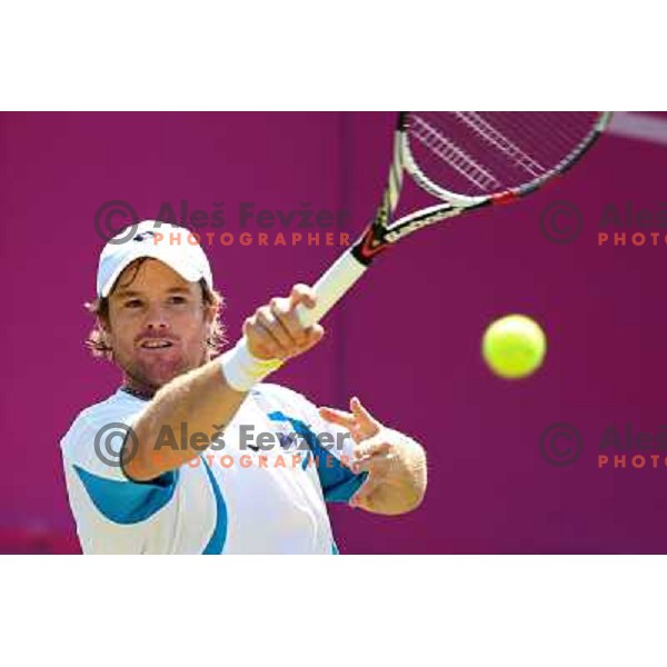 Blaz Kavcic of Slovenia in action in first round of tennis tournament in Wimbledon during London 2012 Summer Olympic Games, Great Britain on July 30, 2012 
