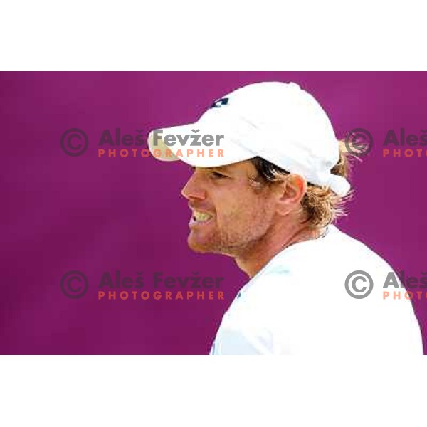 Blaz Kavcic of Slovenia in action in first round of tennis tournament in Wimbledon during London 2012 Summer Olympic Games, Great Britain on July 30, 2012 