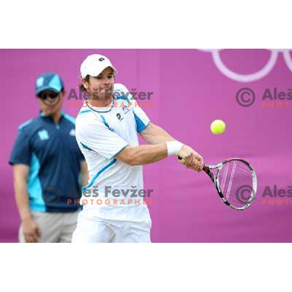 Blaz Kavcic of Slovenia in action in first round of tennis tournament in Wimbledon during London 2012 Summer Olympic Games, Great Britain on July 30, 2012 