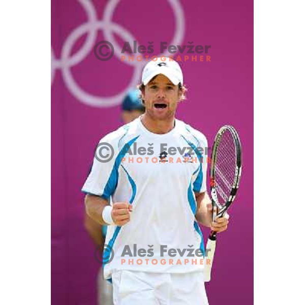 Blaz Kavcic of Slovenia in action in first round of tennis tournament in Wimbledon during London 2012 Summer Olympic Games, Great Britain on July 30, 2012 