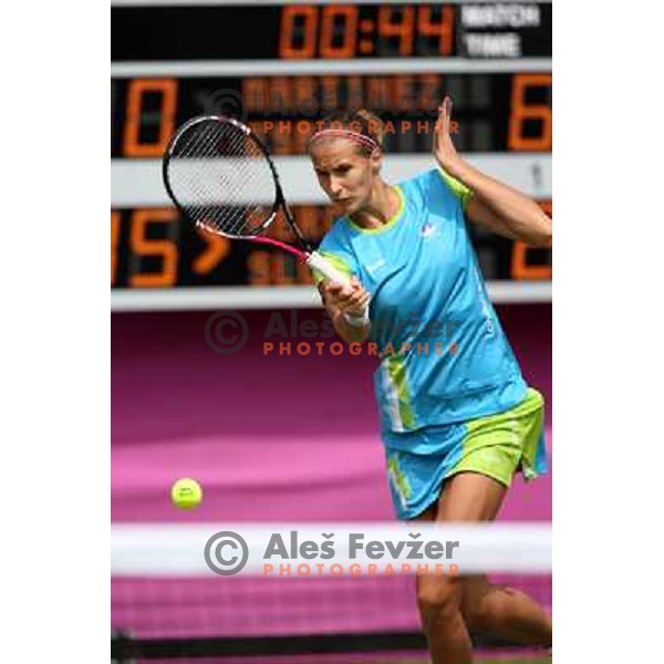 Polona Hercog of Slovenia in action in first round of tennis tournament in Wimbledon during London 2012 Summer Olympic Games, Great Britain on July 30, 2012 