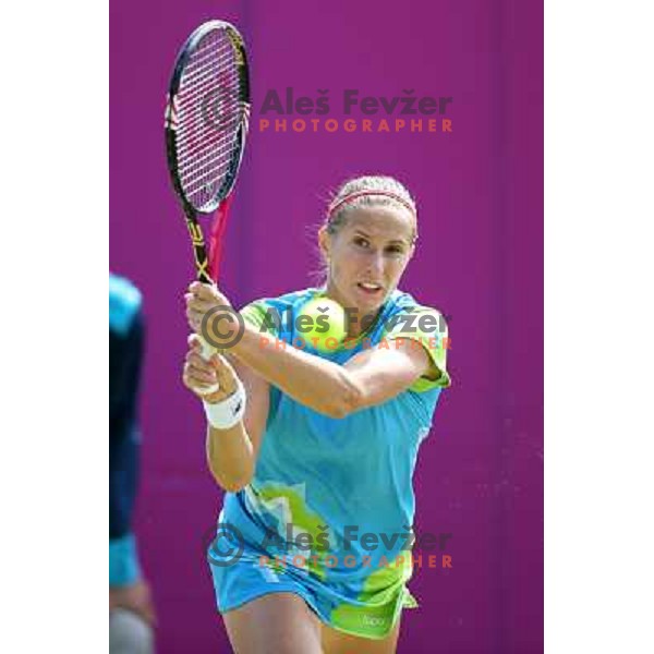 Polona Hercog of Slovenia in action in first round of tennis tournament in Wimbledon during London 2012 Summer Olympic Games, Great Britain on July 30, 2012 