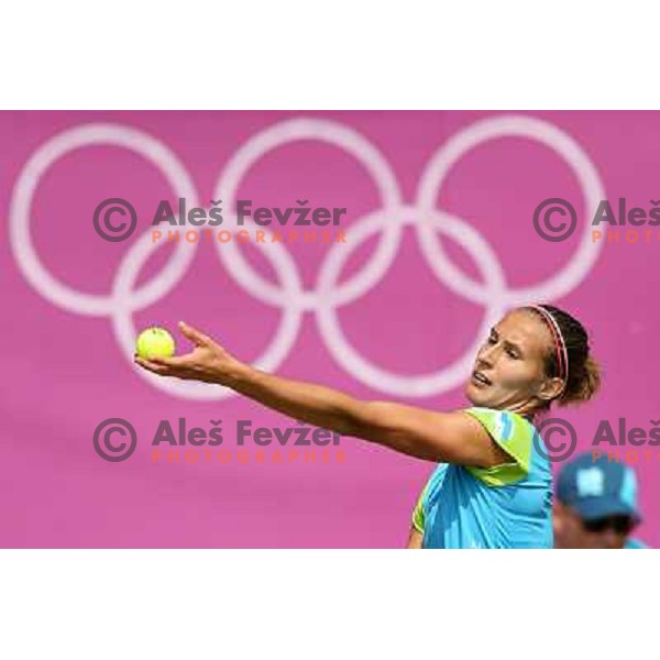Polona Hercog of Slovenia in action in first round of tennis tournament in Wimbledon during London 2012 Summer Olympic Games, Great Britain on July 30, 2012 