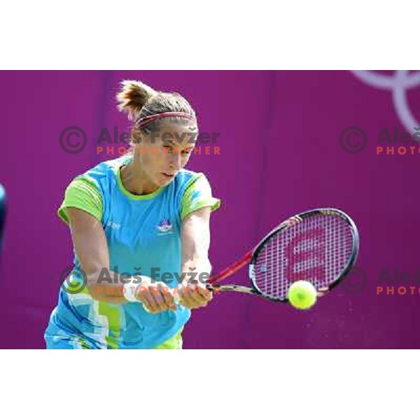 Polona Hercog of Slovenia in action in first round of tennis tournament in Wimbledon during London 2012 Summer Olympic Games, Great Britain on July 30, 2012 