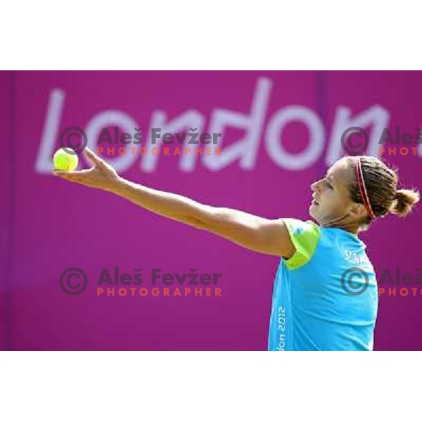 Polona Hercog of Slovenia in action in first round of tennis tournament in Wimbledon during London 2012 Summer Olympic Games, Great Britain on July 30, 2012 
