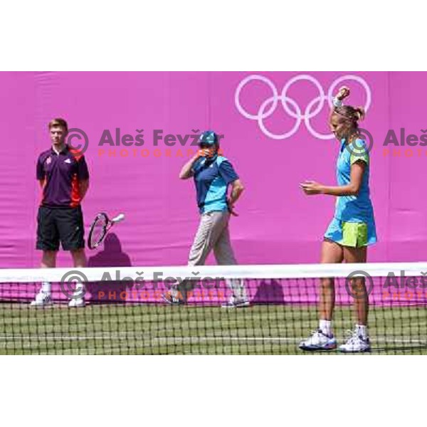 Polona Hercog of Slovenia in action in first round of tennis tournament in Wimbledon during London 2012 Summer Olympic Games, Great Britain on July 30, 2012 