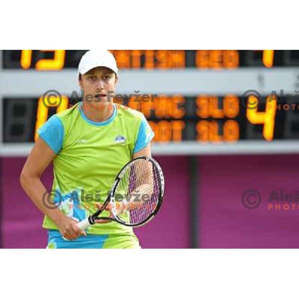 Katarina Srebotnik of Slovenia in action in first round of women\'s doubles tennis tournament in Wimbledon during London 2012 Summer Olympic Games, Great Britain on July 30, 2012 