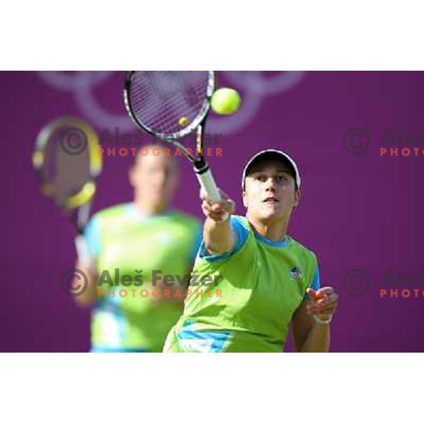 Katarina Srebotnik of Slovenia in action in first round of women\'s doubles tennis tournament in Wimbledon during London 2012 Summer Olympic Games, Great Britain on July 30, 2012 