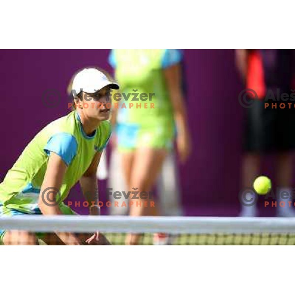 Katarina Srebotnik of Slovenia in action in first round of women\'s doubles tennis tournament in Wimbledon during London 2012 Summer Olympic Games, Great Britain on July 30, 2012 