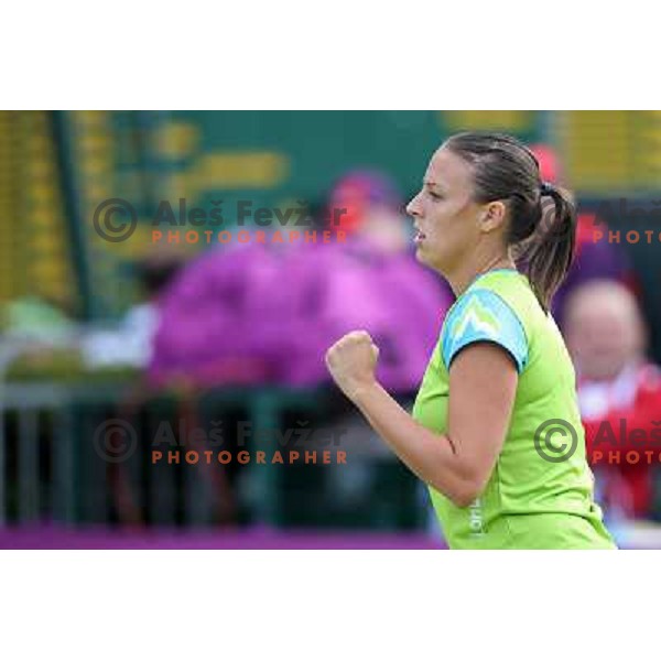Andreja Klepac of Slovenia in action in first round of women\'s doubles tennis tournament in Wimbledon during London 2012 Summer Olympic Games, Great Britain on July 30, 2012 
