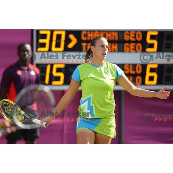 Andreja Klepac of Slovenia in action in first round of women\'s doubles tennis tournament in Wimbledon during London 2012 Summer Olympic Games, Great Britain on July 30, 2012 