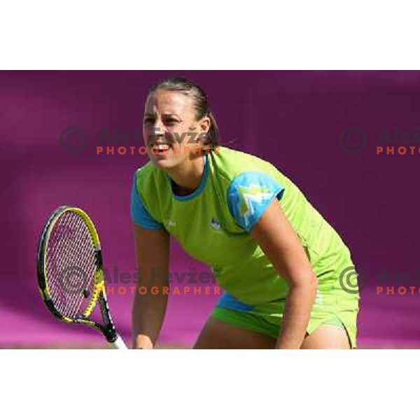 Andreja Klepac of Slovenia in action in first round of women\'s doubles tennis tournament in Wimbledon during London 2012 Summer Olympic Games, Great Britain on July 30, 2012 