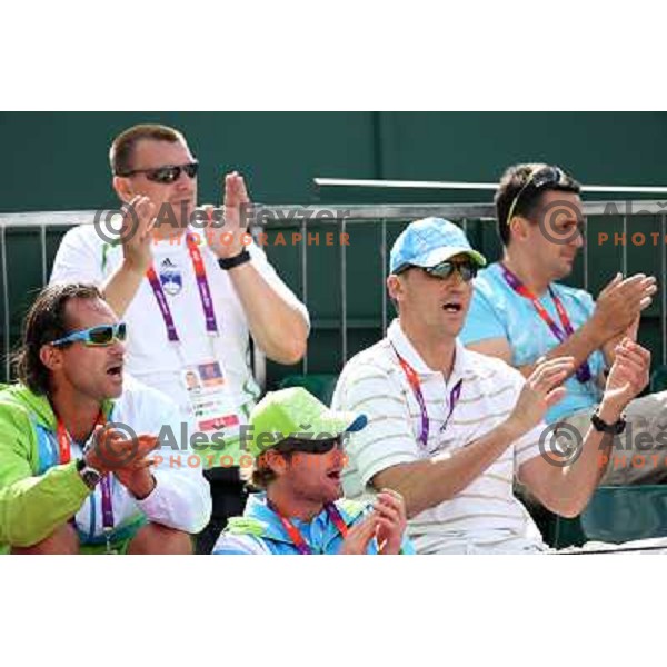 Blaz Trupej and Blaz Kavcic of Slovenia watching first round of tennis tournament in Wimbledon during London 2012 Summer Olympic Games, Great Britain on July 30, 2012 