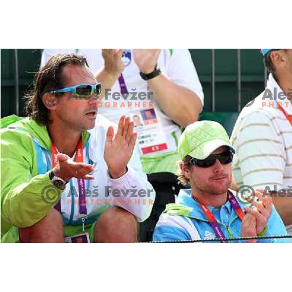 Blaz Trupej and Blaz Kavcic of Slovenia watching first round of tennis tournament in Wimbledon during London 2012 Summer Olympic Games, Great Britain on July 30, 2012 