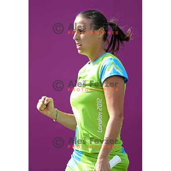 Andreja Klepac of Slovenia in action in first round of women\'s doubles tennis tournament in Wimbledon during London 2012 Summer Olympic Games, Great Britain on July 30, 2012 
