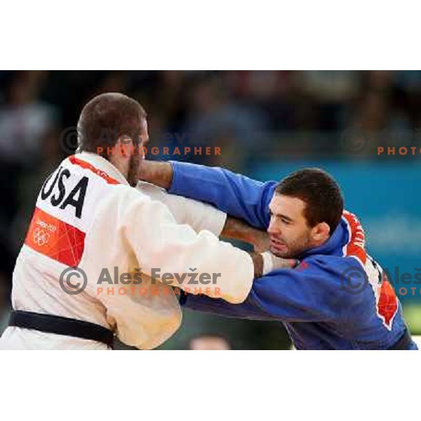 Aljaz Sedej of Slovenia fights with Travis Stevens of USA in first round of -81 kg judo tournament in Excel exhibition centre during London 2012 Summer Olympic Games, Great Britain on July 31, 2012 