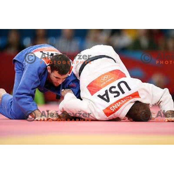 Aljaz Sedej of Slovenia fights with Travis Stevens of USA in first round of -81 kg judo tournament in Excel exhibition centre during London 2012 Summer Olympic Games, Great Britain on July 31, 2012 