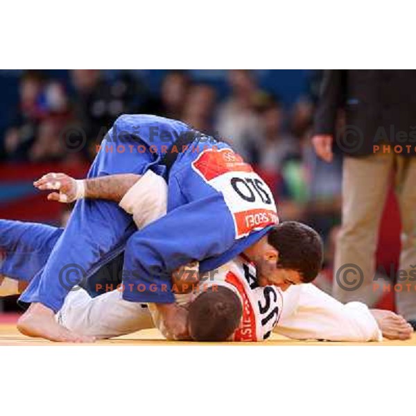 Aljaz Sedej of Slovenia fights with Travis Stevens of USA in first round of -81 kg judo tournament in Excel exhibition centre during London 2012 Summer Olympic Games, Great Britain on July 31, 2012 