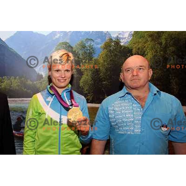 Urska Zolnir and coach Marjan Fabjan of Slovenia at medal reception in Slovenia pub in Camden during London 2012 Summer Olympic games on 1st of August, 2012 