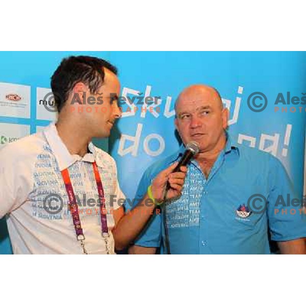 Matic Svab and coach Marjan Fabjan of Slovenia at medal reception in Slovenia pub in Camden during London 2012 Summer Olympic games on 1st of August, 2012 