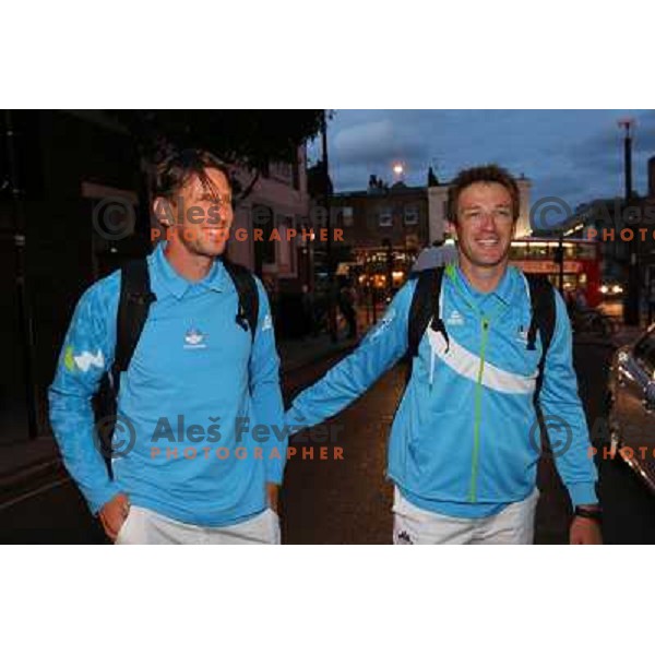 Iztok Cop and Luka Spik of Slovenia, Olympic bronze medalists in double sculls at Eton Dorney celebrate their medal with fans in Slovenia pub in Camden during London 2012 Summer Olympic games, Great Britain on 2nd of August 2012 