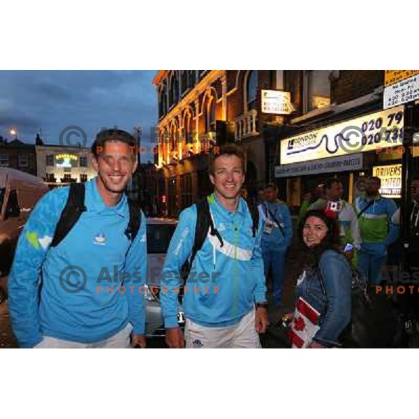 Iztok Cop and Luka Spik of Slovenia, Olympic bronze medalists in double sculls at Eton Dorney celebrate their medal with fans in Slovenia pub in Camden during London 2012 Summer Olympic games, Great Britain on 2nd of August 2012 