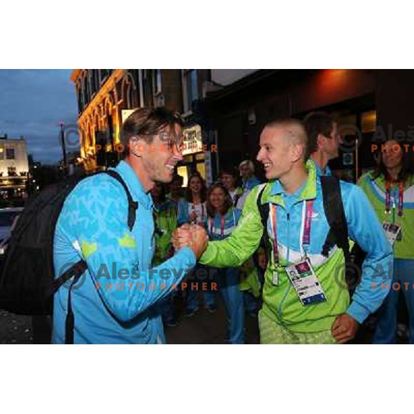  Luka Spik of Slovenia, Olympic bronze medalist in double sculls at Eton Dorney and Robert Zbogar celebrate medal with fans in Slovenia pub in Camden during London 2012 Summer Olympic games, Great Britain on 2nd of August 2012 