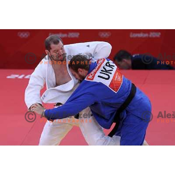 Matjaz Ceraj of Slovenia fights in first round of judo tournament 100+ category in ExCel during London 2012 Summer Olympic games, Great Britain on August 3,2012 
