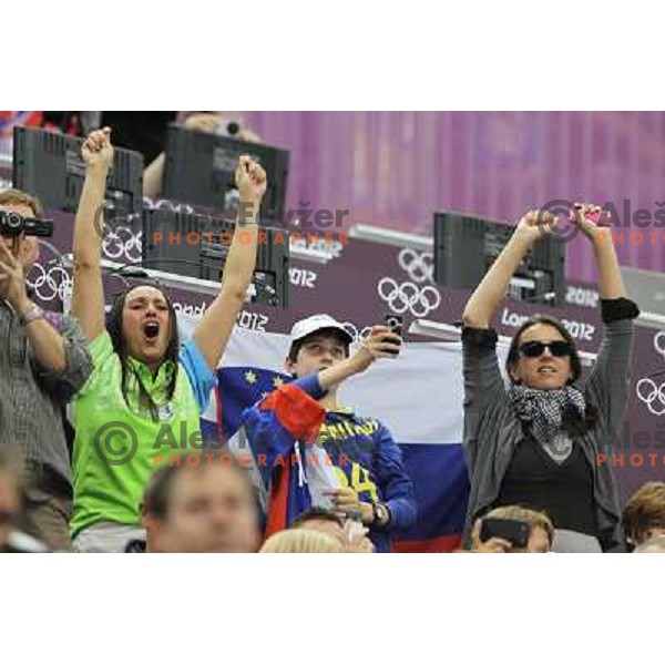 Slovenian fans cheer at men\'s 50 m Rifle Prone shooting competition at Royal Artillery Barracks, London 2012 Olympic games, Great Britain on August 3, 2012 