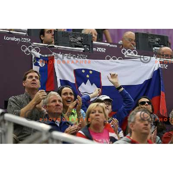 Slovenian fans cheer at men\'s 50 m Rifle Prone shooting competition at Royal Artillery Barracks, London 2012 Olympic games, Great Britain on August 3, 2012 