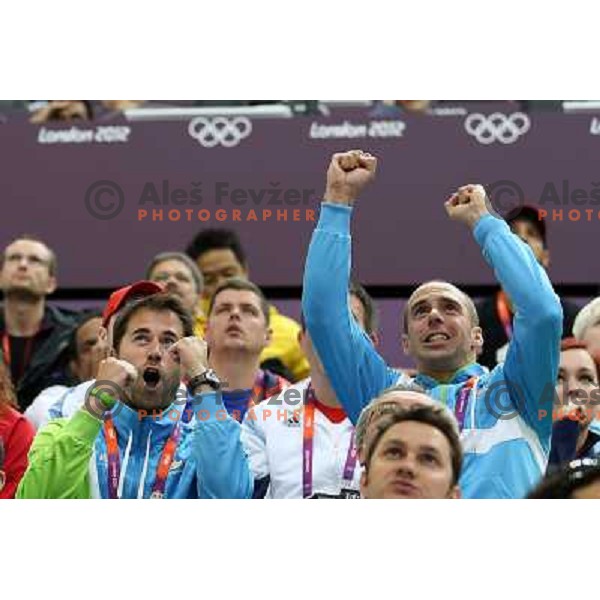 Matej Zupanc, David Zalar cheer at men\'s 50 m Rifle Prone shooting competition at Royal Artillery Barracks, London 2012 Olympic games, Great Britain on August 3, 2012 