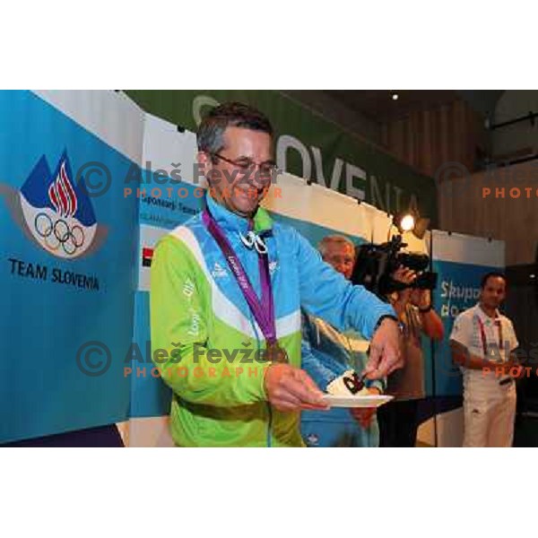 Rajmond Debevec celebrates his bronze olympic medal in shooting with fans and sponsors of OKS in Slovenia pub in Camden during London 2012 Summer Olympic Games, Great Britain on August 3, 2012 