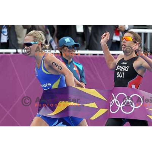 Nicola Spirig (SUI, nr.43)Olympic gold medalist and Lisa Norden (SWE,nr.20) silver medalist compete in women\'s triathlon in Hyde Park during London 2012 Summer Olympic Games, Great Britain on August 4, 2012 