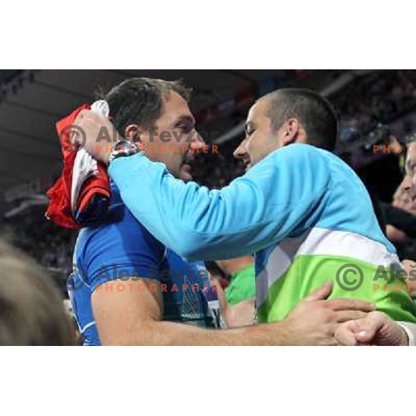 Primoz Kozmus of Slovenia, Olympic silver medalist in hammer throw at Olympic stadium and Primoz Cetrtic during London 2012 Summer Olympic games, Great Britain on August 5,2012 