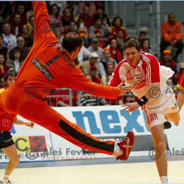 Hombrados tries to stop Mirza Dzomba shot