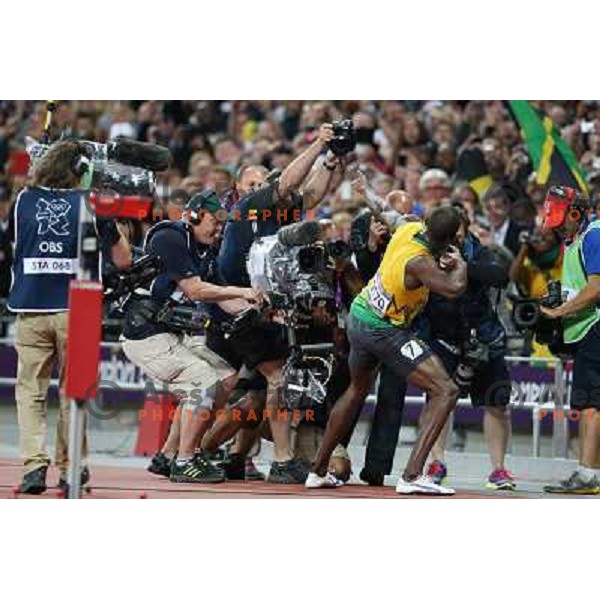 Usain Bolt of Jamaica, Olympic gold medalist at 100 meters at Olympic stadium during London 2012 Olympic games on August 5, 2012 