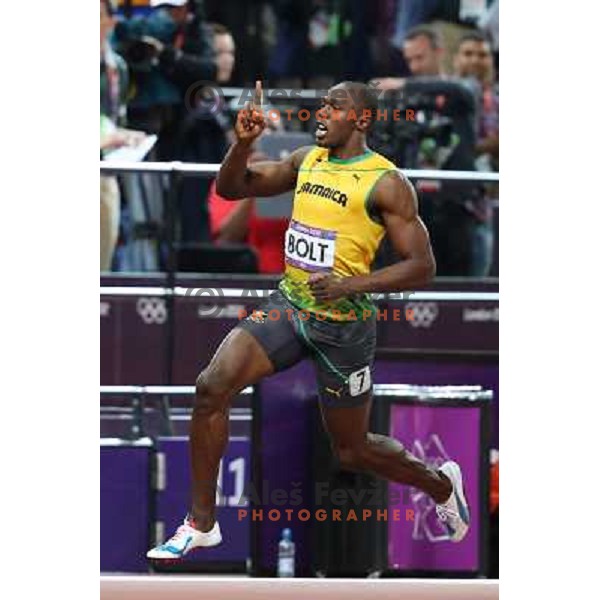 Usain Bolt of Jamaica, Olympic gold medalist at 100 meters at Olympic stadium during London 2012 Olympic games on August 5, 2012 