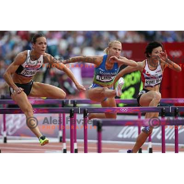 Marina Tomic of Slovenia runs in qualification heat of women\'s 100 meters hurdles at Olympic stadium during London 2012 Summer Olympic games, Great Britain on August 6,2012 