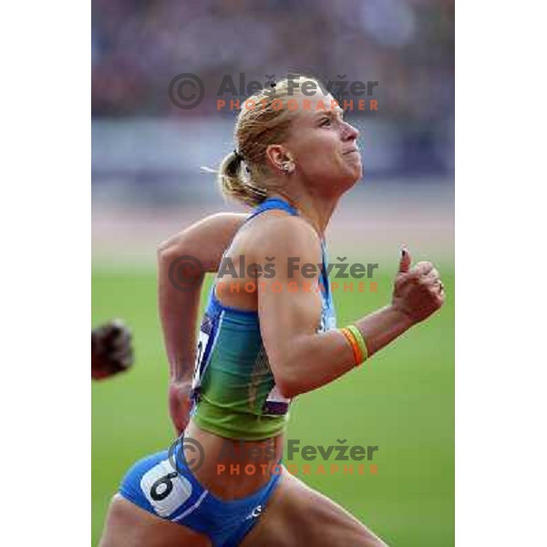 Marina Tomic of Slovenia runs in qualification heat of women\'s 100 meters hurdles at Olympic stadium during London 2012 Summer Olympic games, Great Britain on August 6,2012 