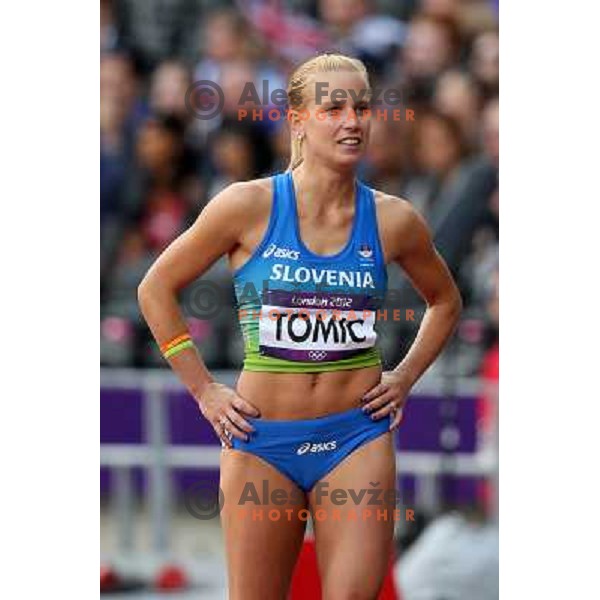 Marina Tomic of Slovenia runs in qualification heat of women\'s 100 meters hurdles at Olympic stadium during London 2012 Summer Olympic games, Great Britain on August 6,2012 