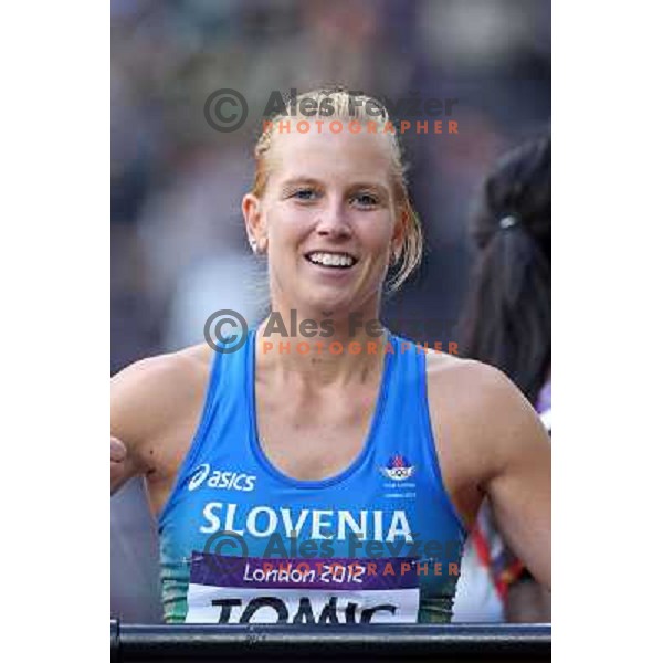 Marina Tomic of Slovenia runs in qualification heat of women\'s 100 meters hurdles at Olympic stadium during London 2012 Summer Olympic games, Great Britain on August 6,2012 