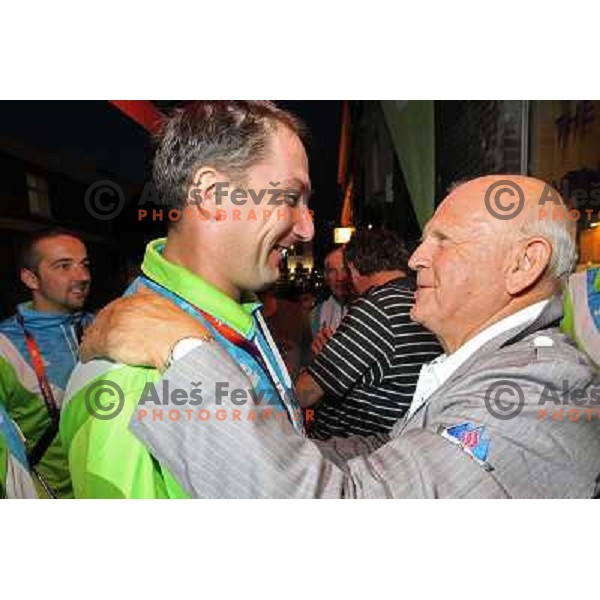 Primoz Kozmus of Slovenia, Olympic silver medalist in hammer throw celebrates his medal with fans in Slovenia pub in Camden during London 2012 Summer Olympic games, Great Britain on August,6 2012 