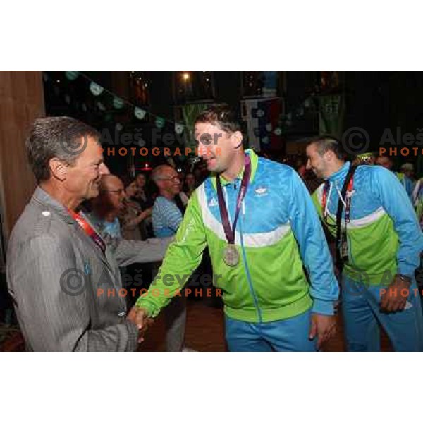 Primoz Kozmus of Slovenia, Olympic silver medalist in hammer throw celebrates his medal with fans in Slovenia pub in Camden during London 2012 Summer Olympic games, Great Britain on August,6 2012 