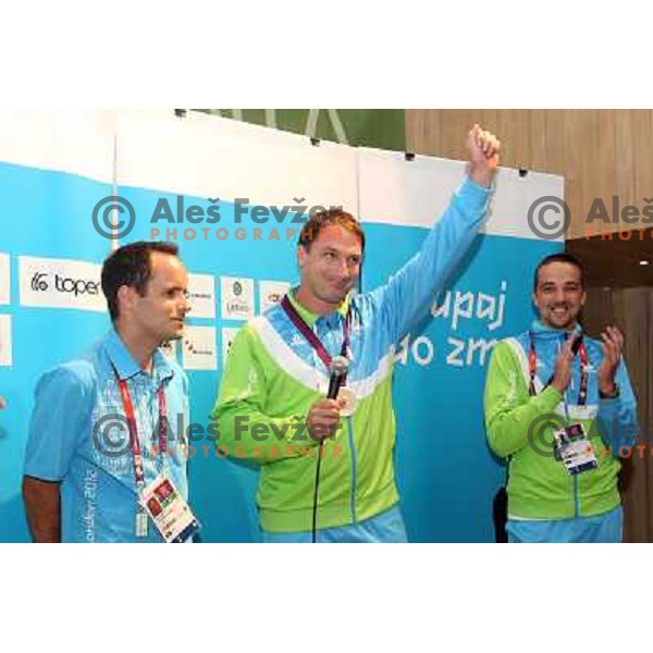 Primoz Kozmus of Slovenia, Olympic silver medalist in hammer throw celebrates his medal with fans in Slovenia pub in Camden during London 2012 Summer Olympic games, Great Britain on August,6 2012 