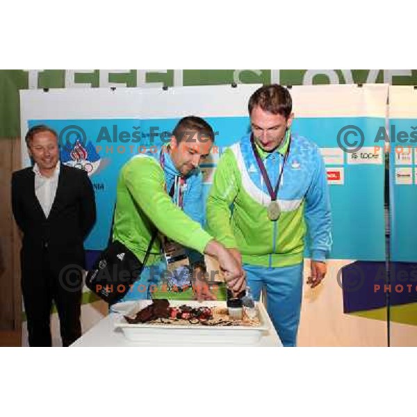 Primoz Kozmus of Slovenia, Olympic silver medalist in hammer throw celebrates his medal with fans in Slovenia pub in Camden during London 2012 Summer Olympic games, Great Britain on August,6 2012 